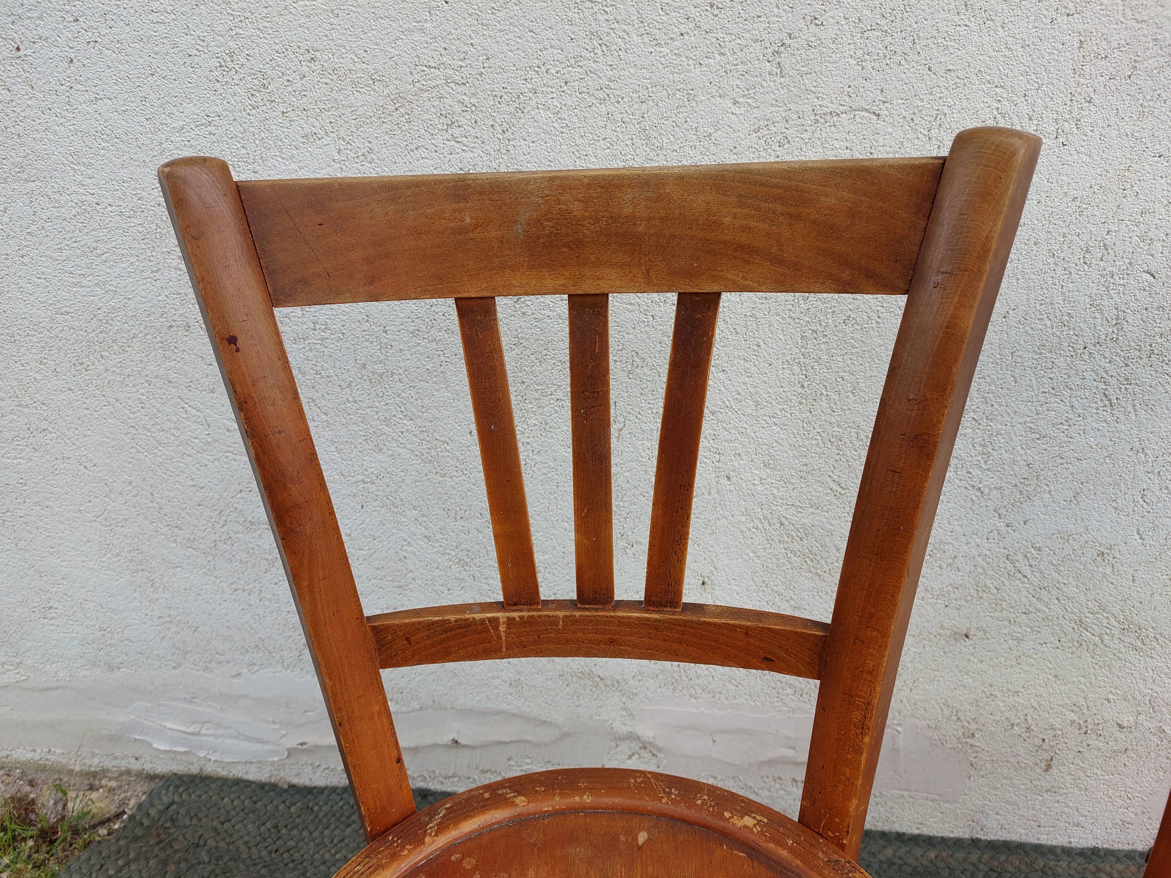 3 wooden bistro chairs