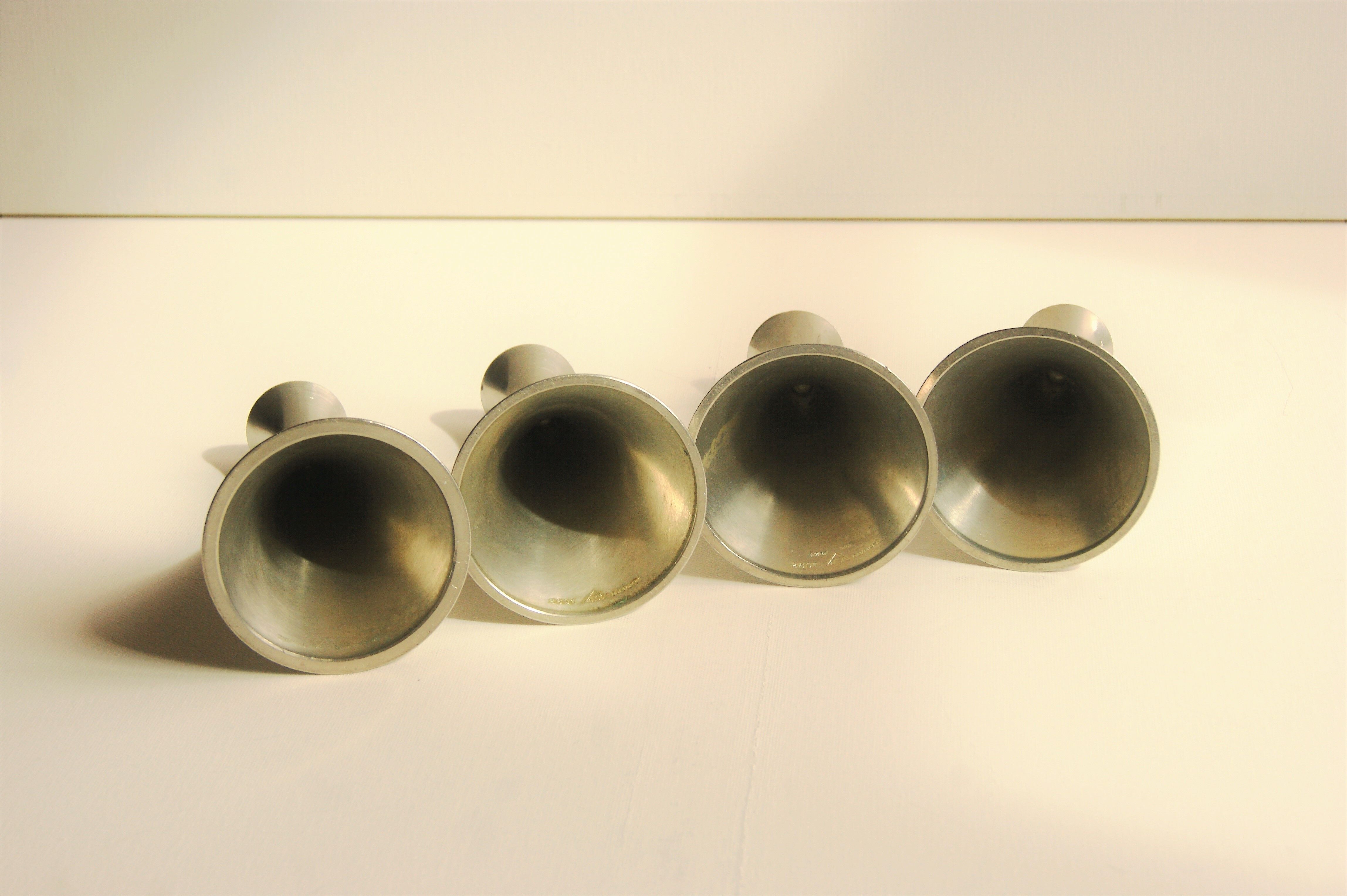 Set of 4 Art Deco candle holders by Just Andersen from the 1940s - fine elegant minimalist design.