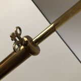 Tripod floor lamp with adjustable height and shelf from the 1960s.