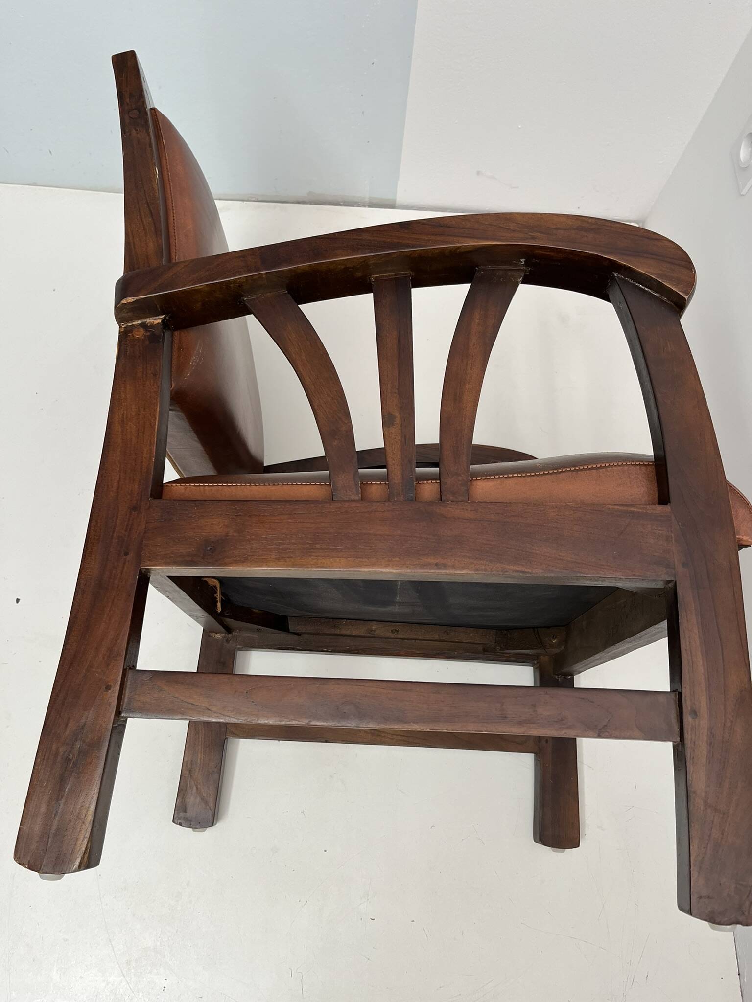 Colonial armchair in teak and leather