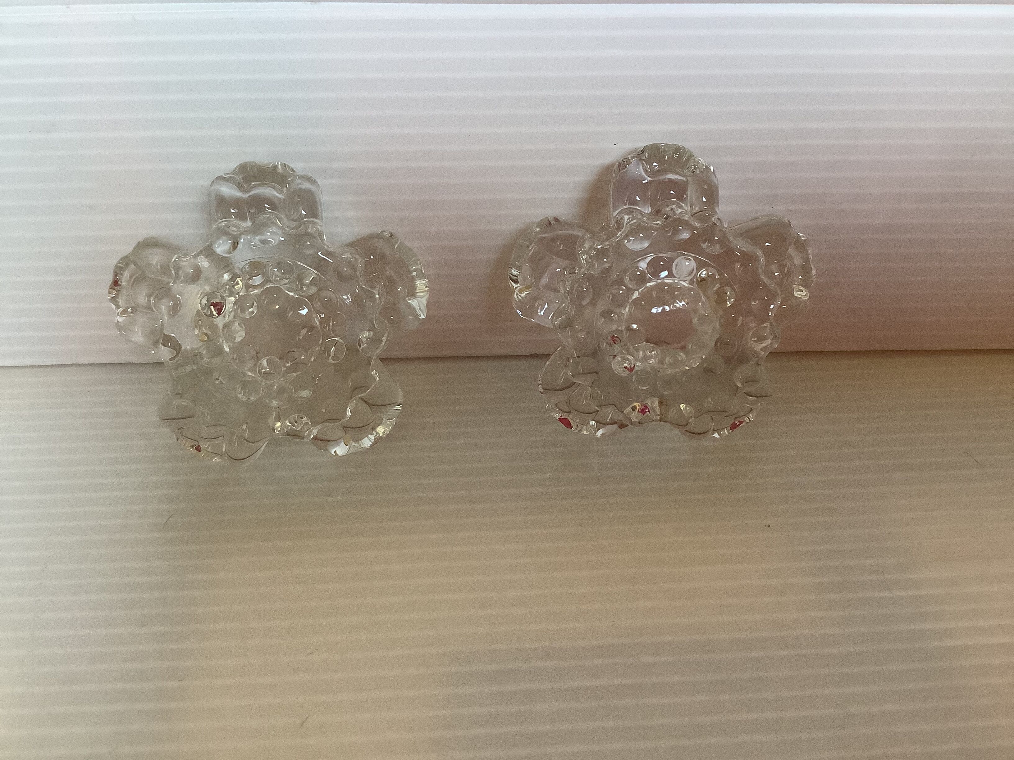 Pair of glass flower candle holders