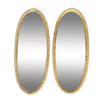Paire de miroirs ovales 1900 stuc doré