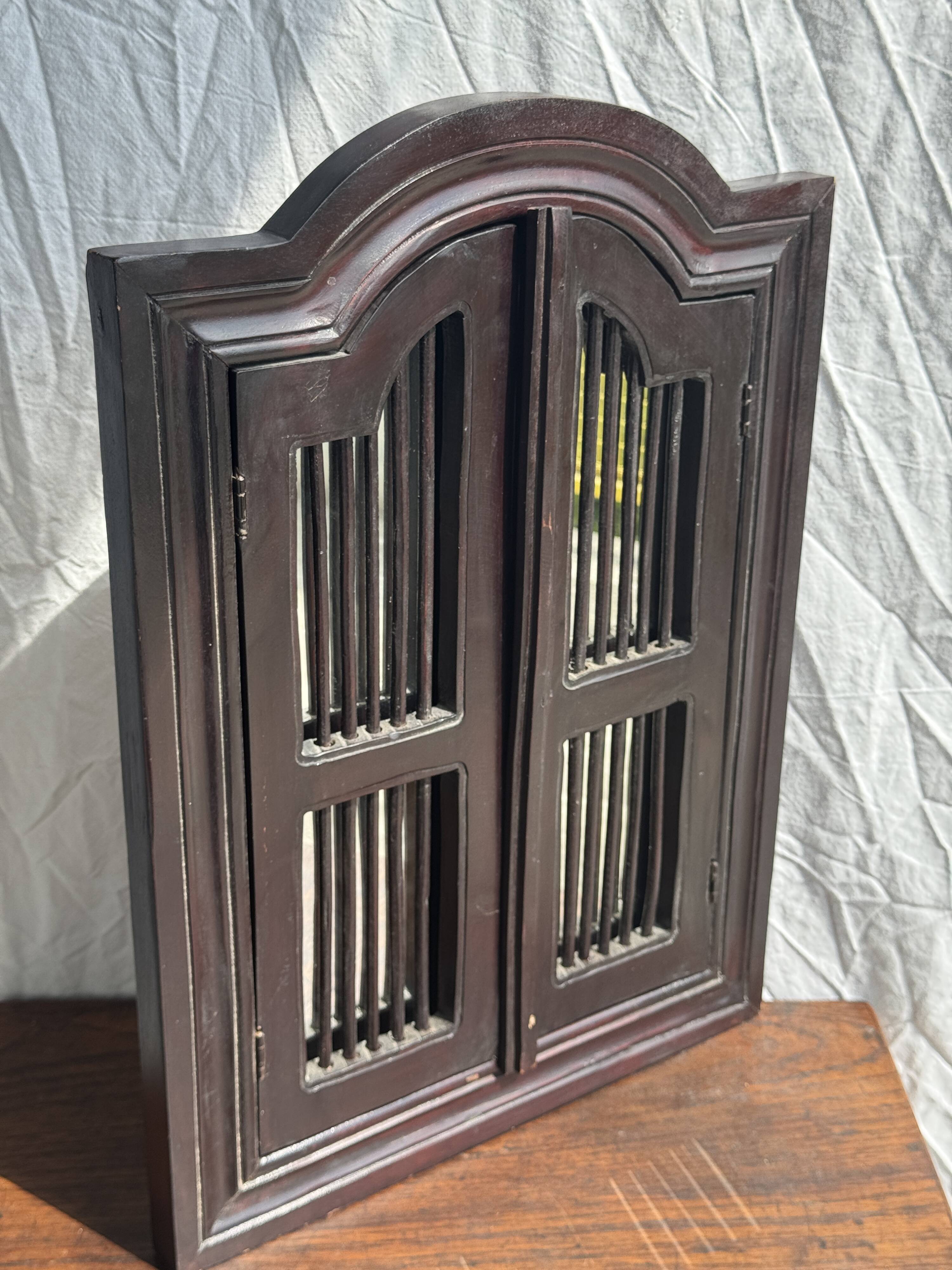 Dark brown wooden mirror with two baguettes H55 L40