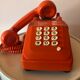 Orange Socotel phone with keys from the 70s 80s