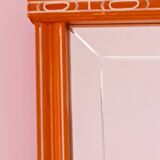 Beveled glass wall mirror in solid wood frame