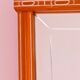 Beveled glass wall mirror in solid wood frame