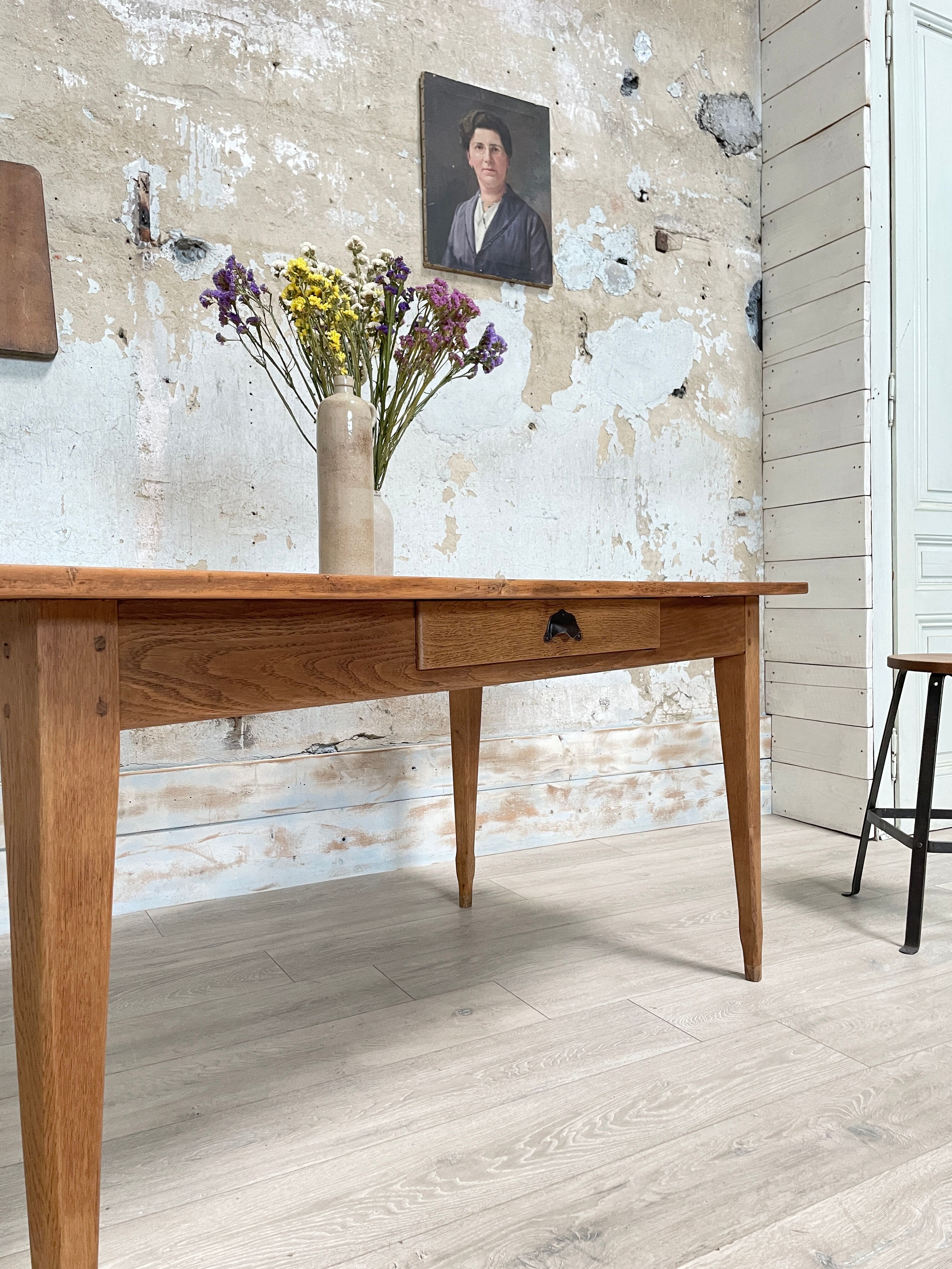 Vintage farmhouse table with spindle legs.