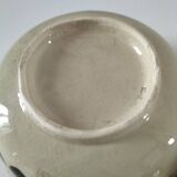 Two large vintage bowls in pastel decor on mini pedestals.