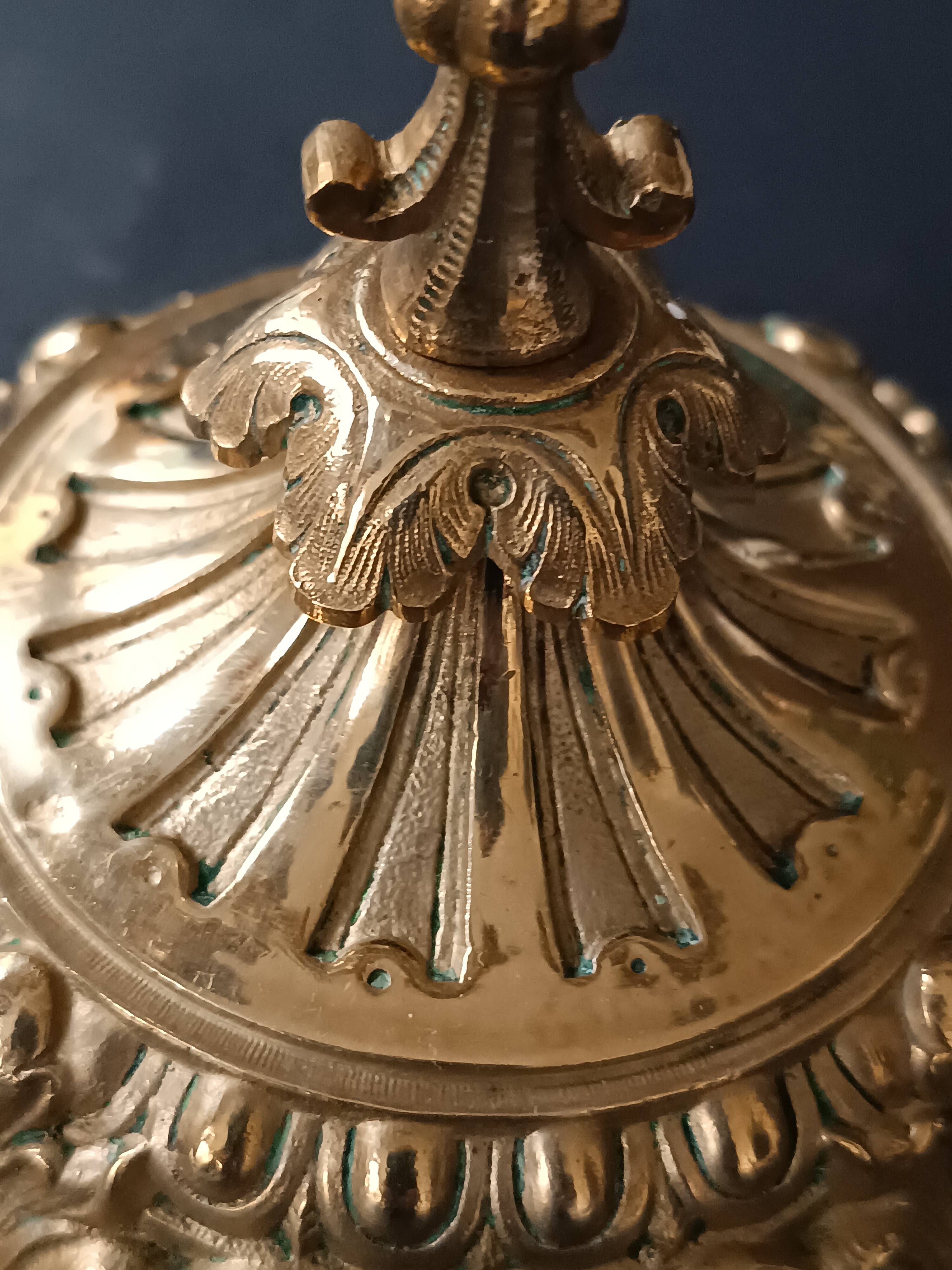 Antique three-light openwork brass church candelabrum.