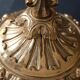 Antique three-light openwork brass church candelabrum.