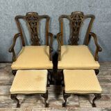 Pair of English armchairs with mahogany footrests circa 1850
