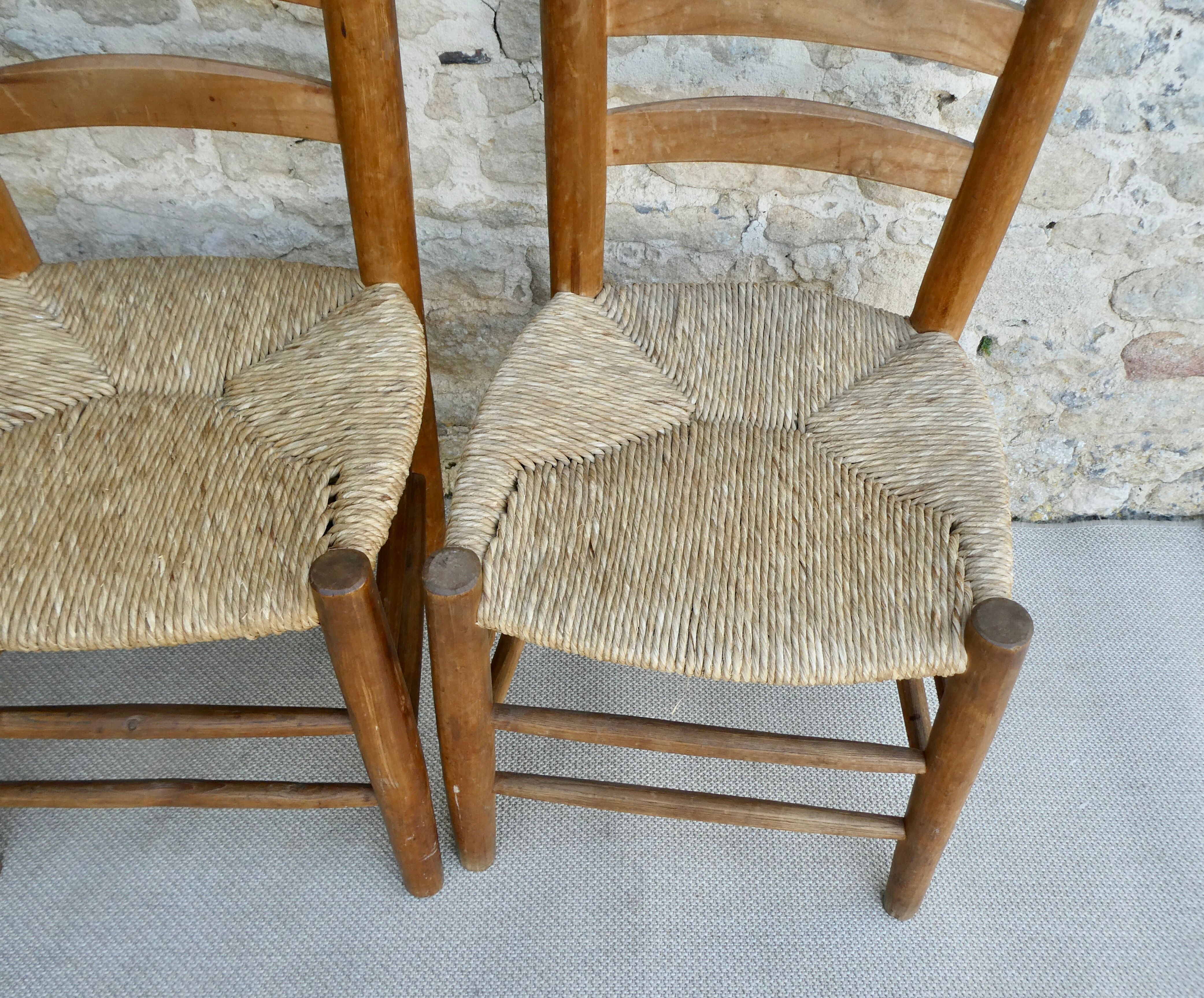 Trio of wooden chairs and mulched seat