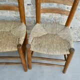 Trio of wooden chairs and mulched seat