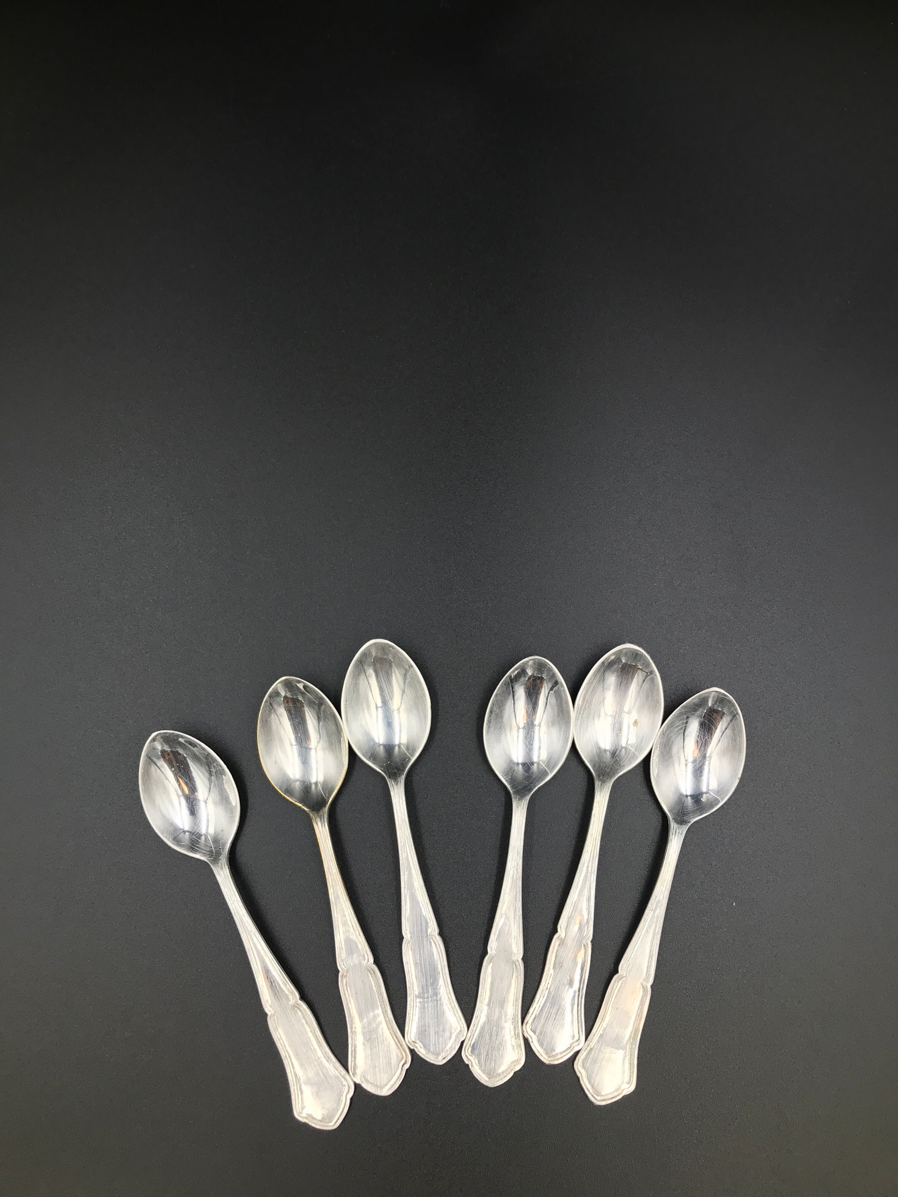 6 small metal silver spoons
