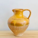 Vintage jug in glazed earth