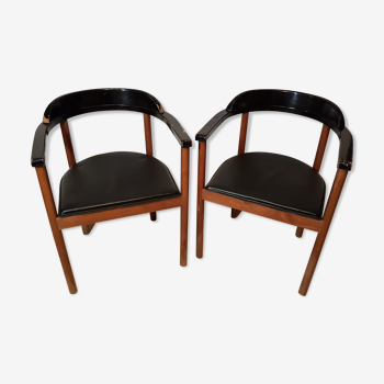 Scandinavian style armchairs with leather seating, the pair