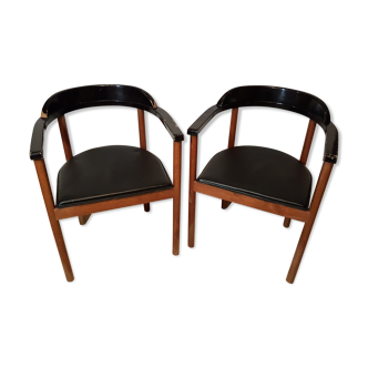 Scandinavian style armchairs with leather seating, the pair
