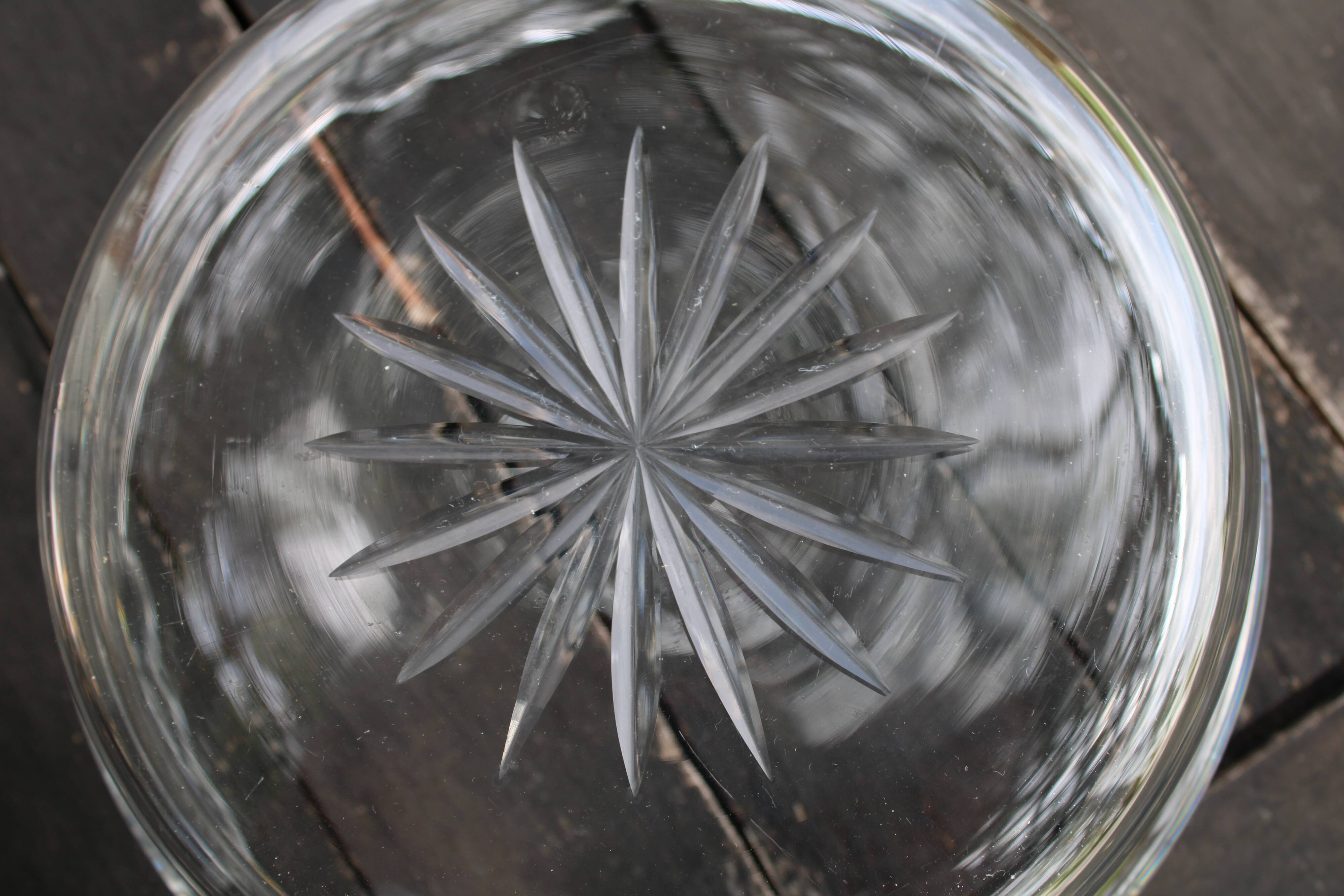 Worked metal fruit basket and glass