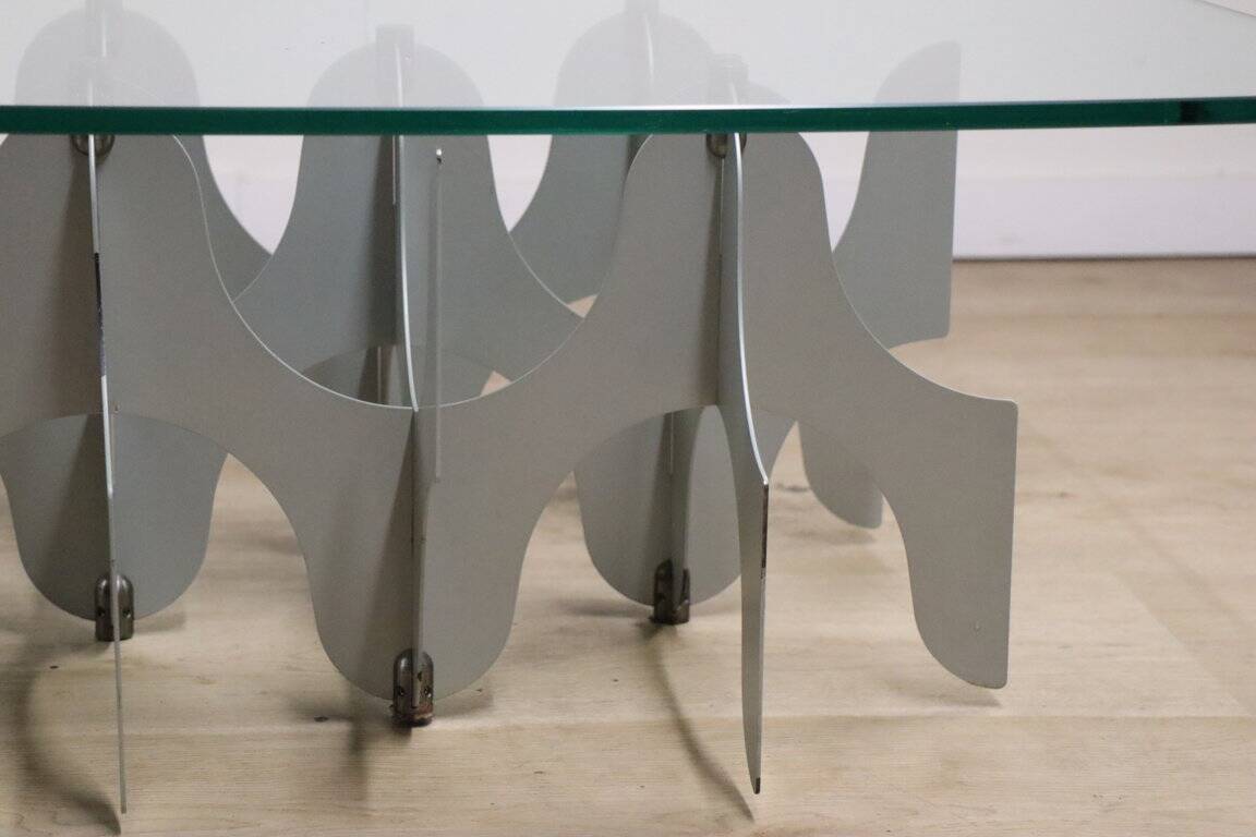 Minimalist sculptural coffee table in metal and glass