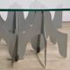 Minimalist sculptural coffee table in metal and glass