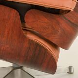 Fauteuil lounge avec repose-pieds en cuir aniline, conçu par Charles et Ray Eames