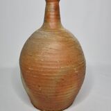 Set of three enamelled terracotta bottles