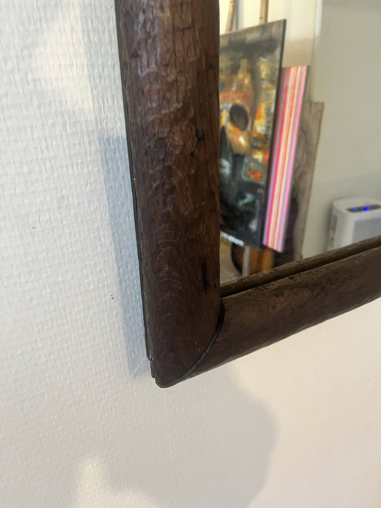 Large vintage mirror with a carved solid wood frame.