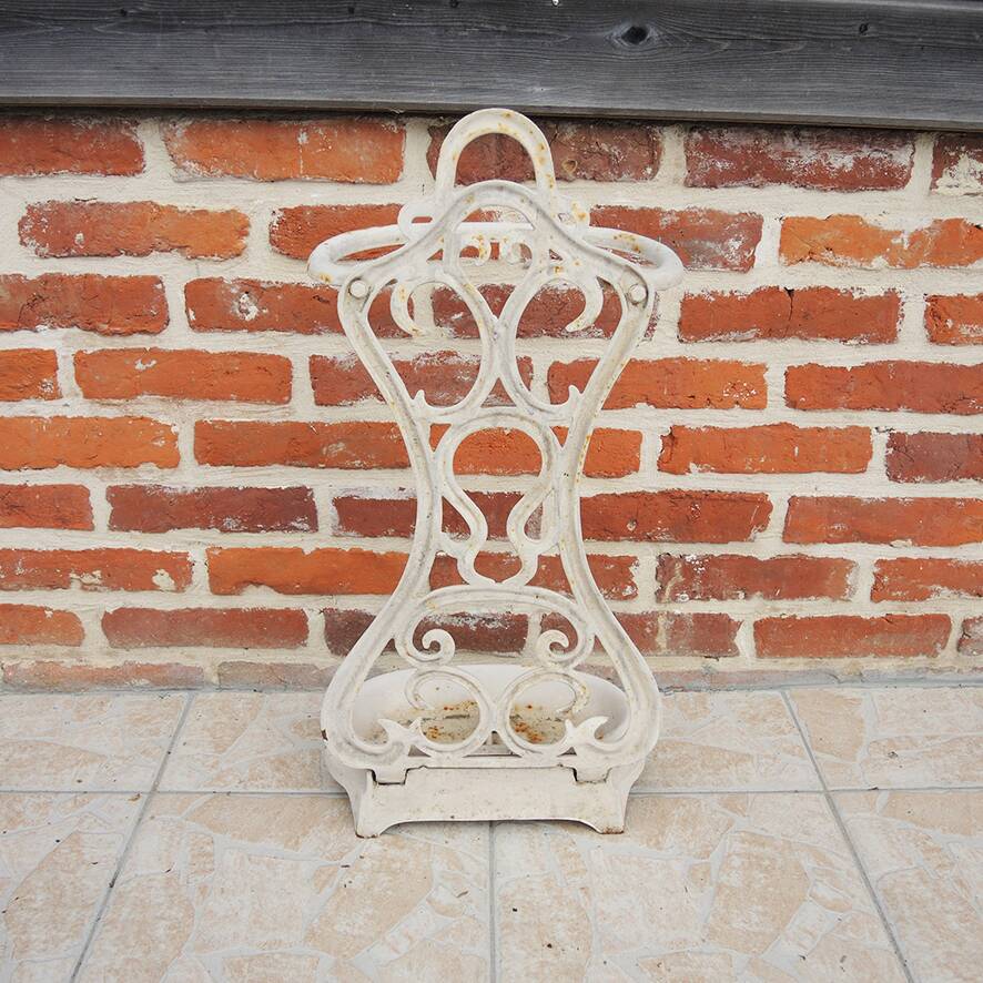 Ancien porte-parapluie en fonte émaillée blanche
