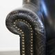 Black grained cowhide leather armchair