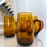 4 mugs/ mugs in vintage blown amber glass