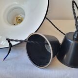 Duo of suspensions in enamelled sheet metal