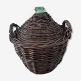 Demijohn in its wicker case