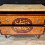 Louis XVI style commode inlaid with a decoration of instruments.