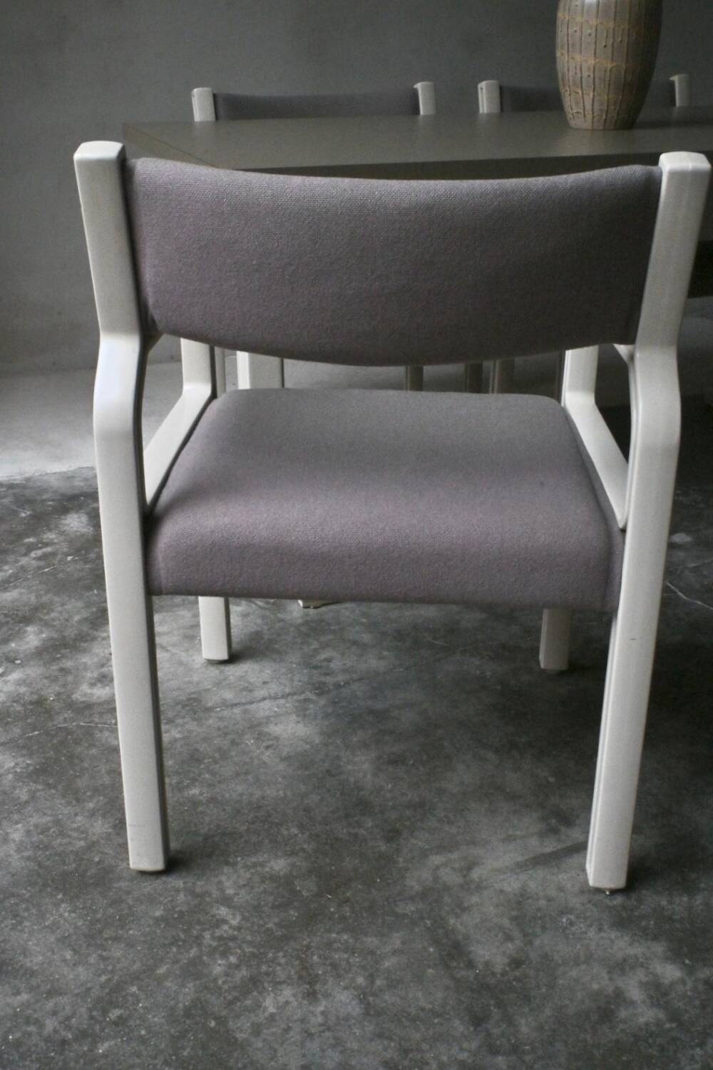 Dining table set and 4 dining chairs by Pierre Mennen for Pastoe.