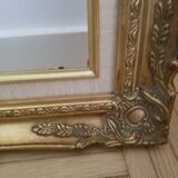 Old gilded frame in solid wood and plaster.