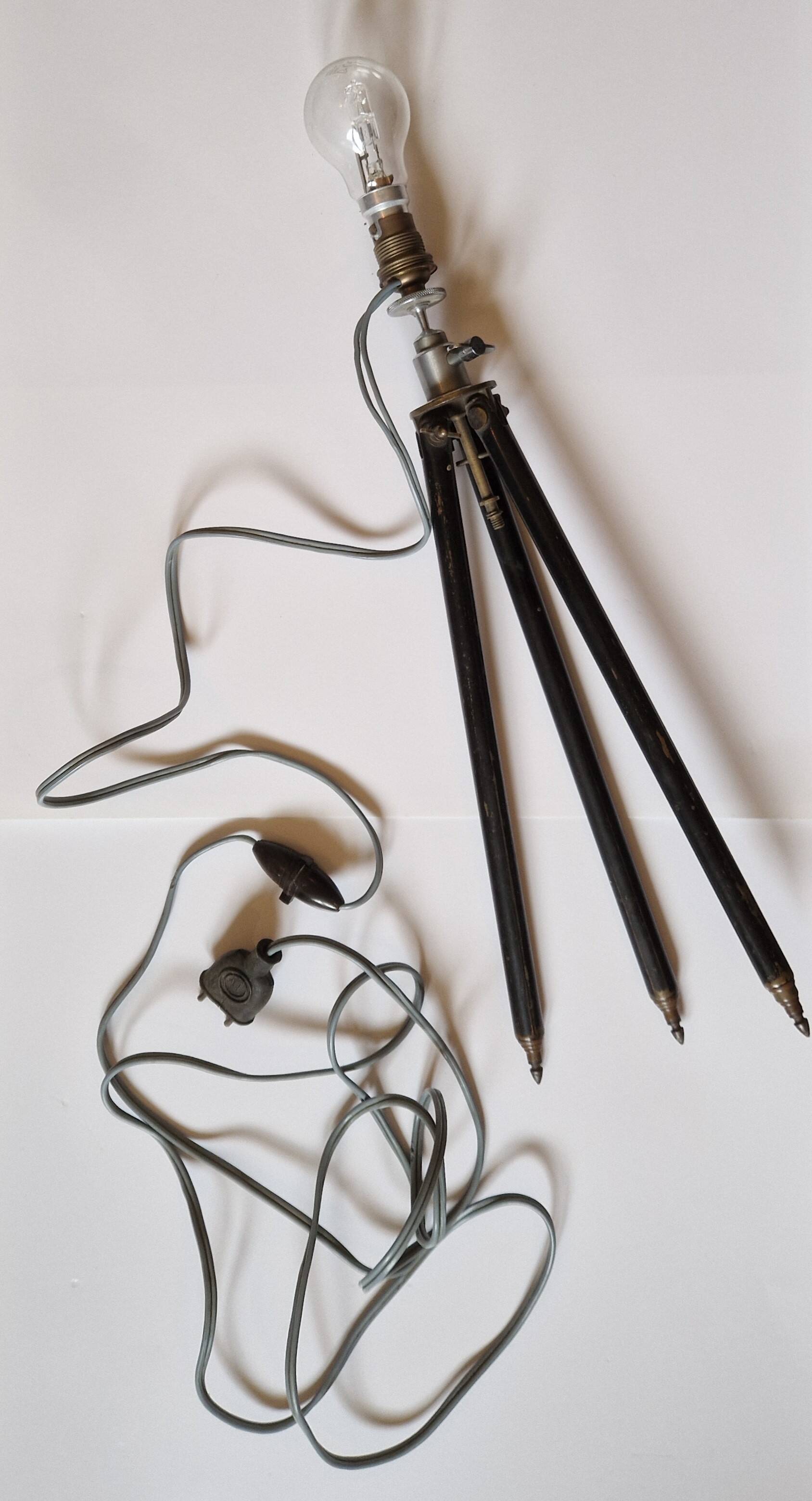 Lamp on old tripod, 1920s