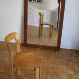 Beveled mirror grooved wood