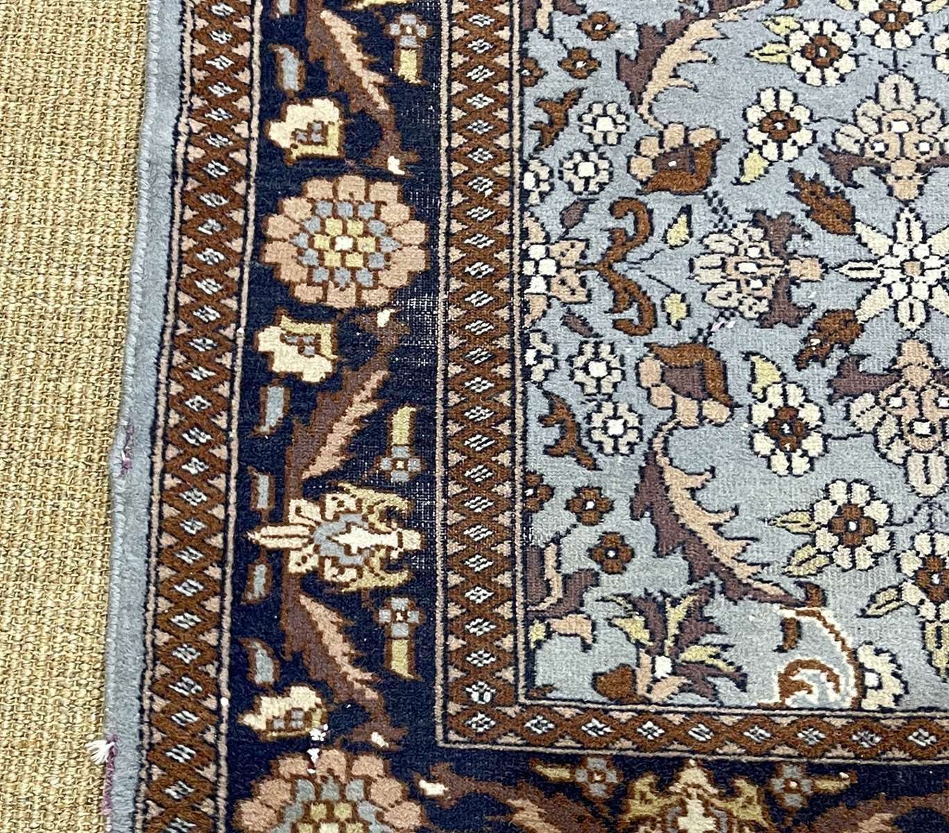 Handmade wool oriental carpet (wear defects)