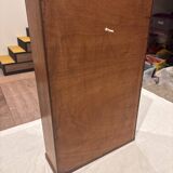 Wall cabinet with oval wall and drawer