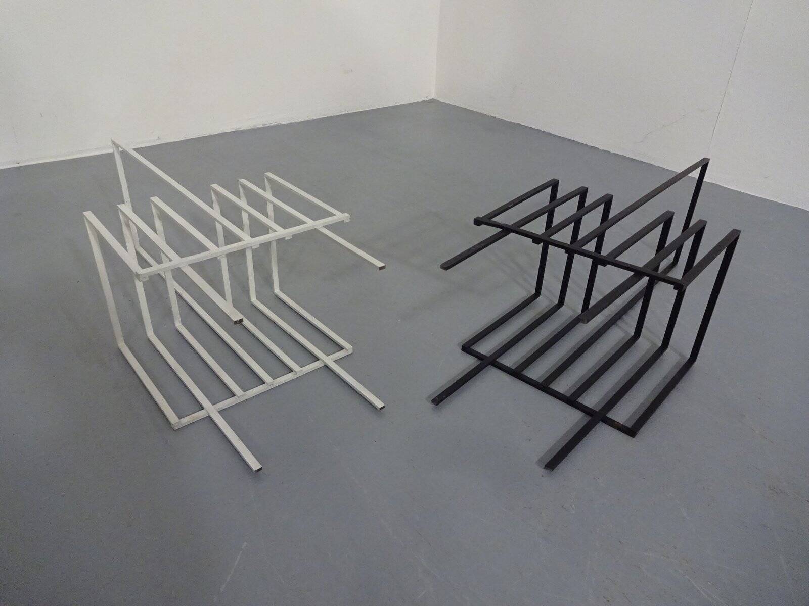 Steel magazine or record racks, 1960s, set of 2