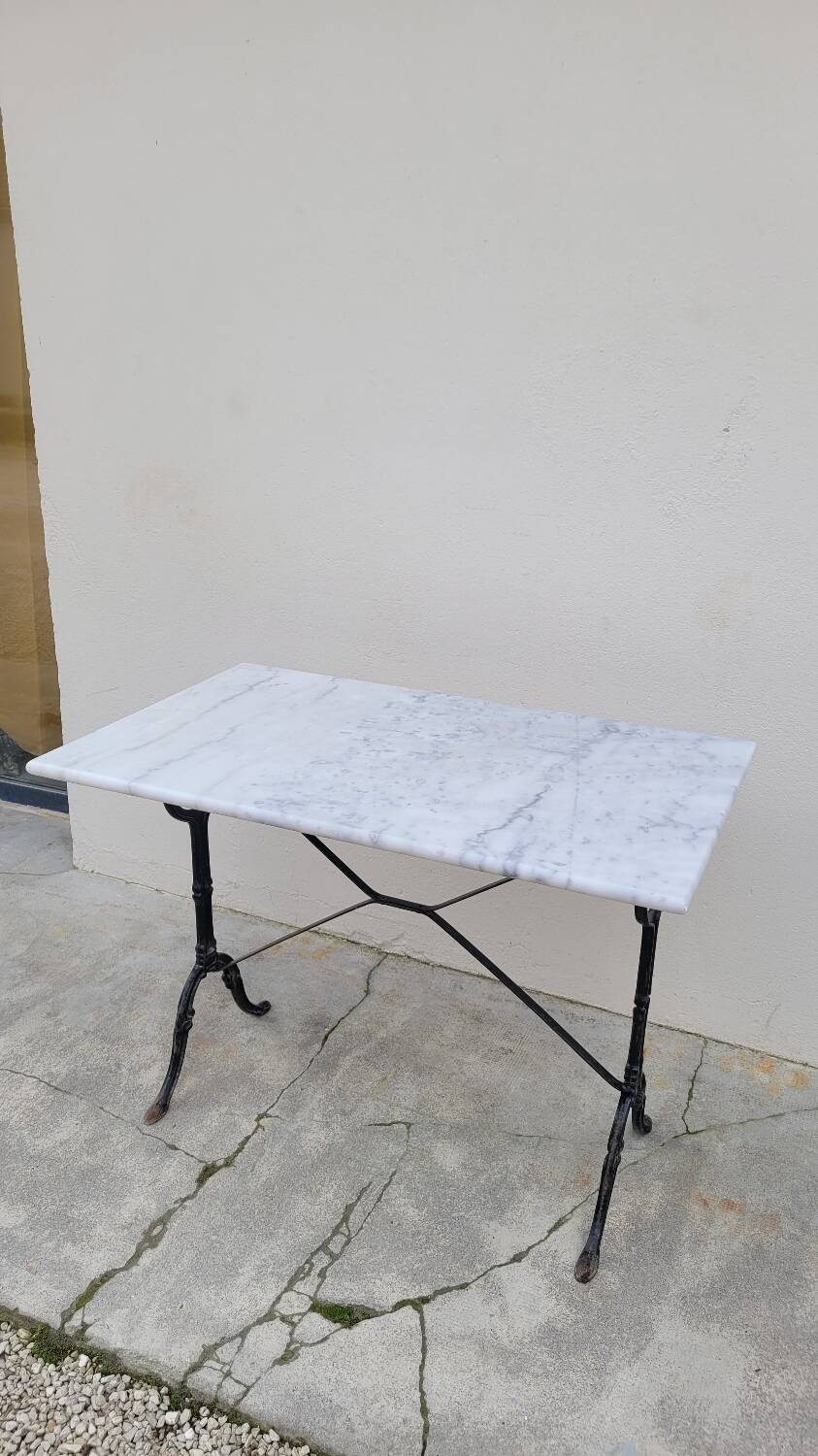Marble and antique cast iron bistro table