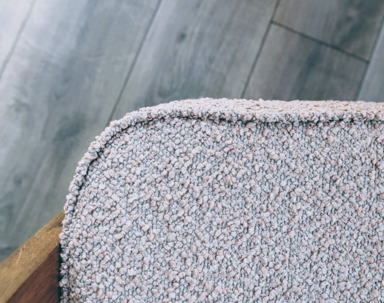 Vintage armchair in oak wood with powder pink boucle design by Chierowski.