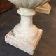 Pair of medicid vasques, cast, exterior