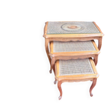 Vintage nesting tables in wood and cane – perfect condition.