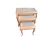 Vintage nesting tables in wood and cane – perfect condition.