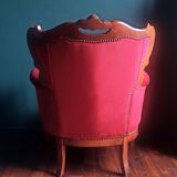 Baroque style carved wooden armchair in burgundy red velvet