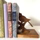 Pair of art deco wooden bookends birds