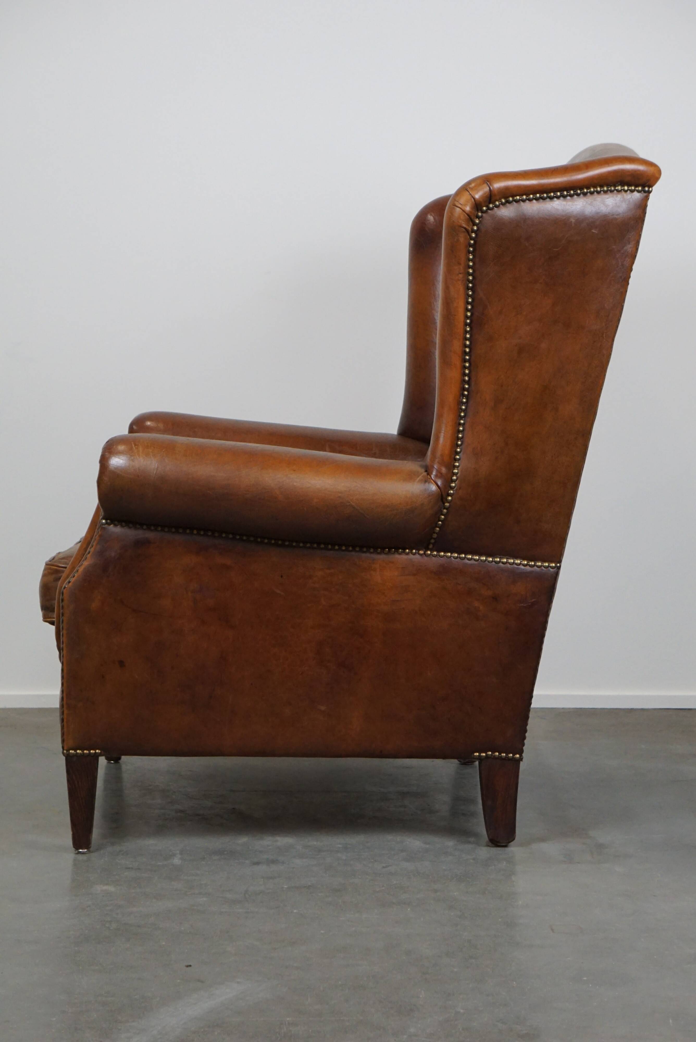 especially comfortable wingback chair made of sheepskin leather, stunning colors