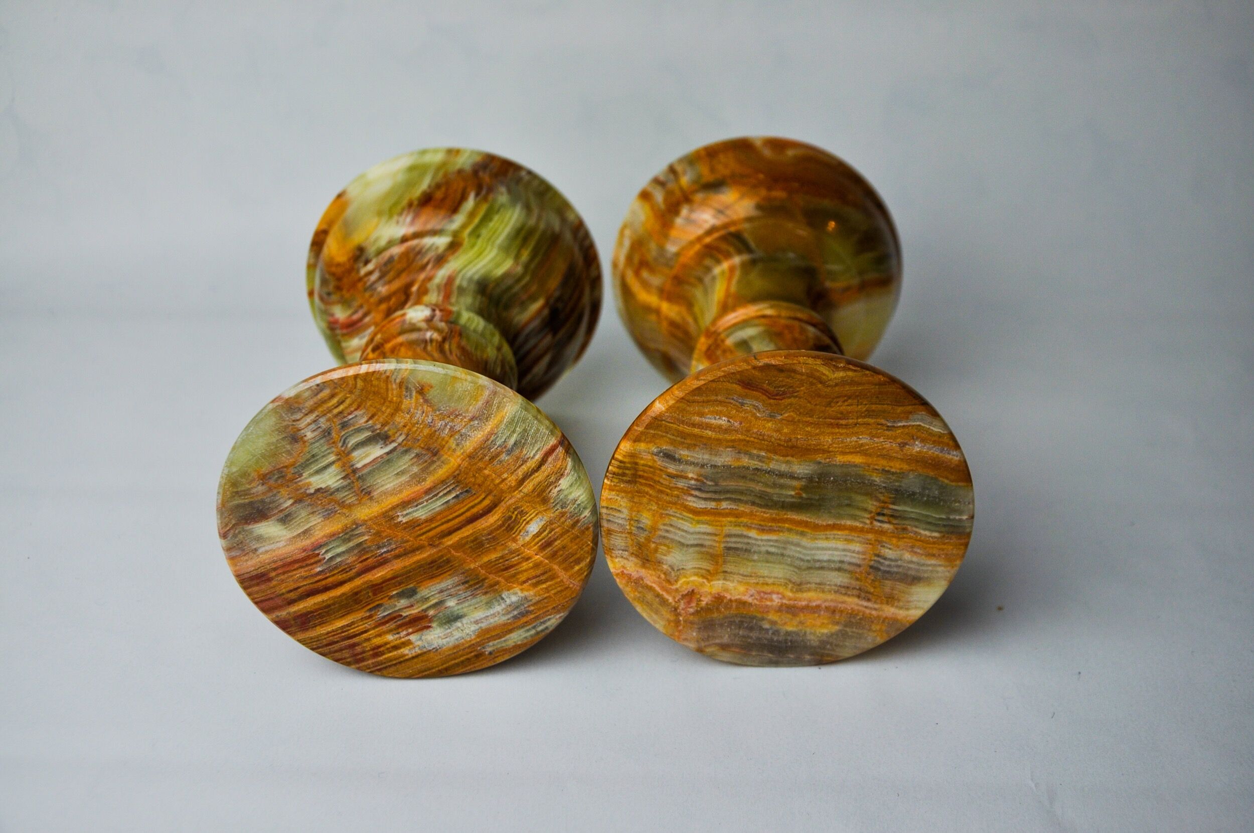 Pair of onyx and brass candle holders, Italy, 1980