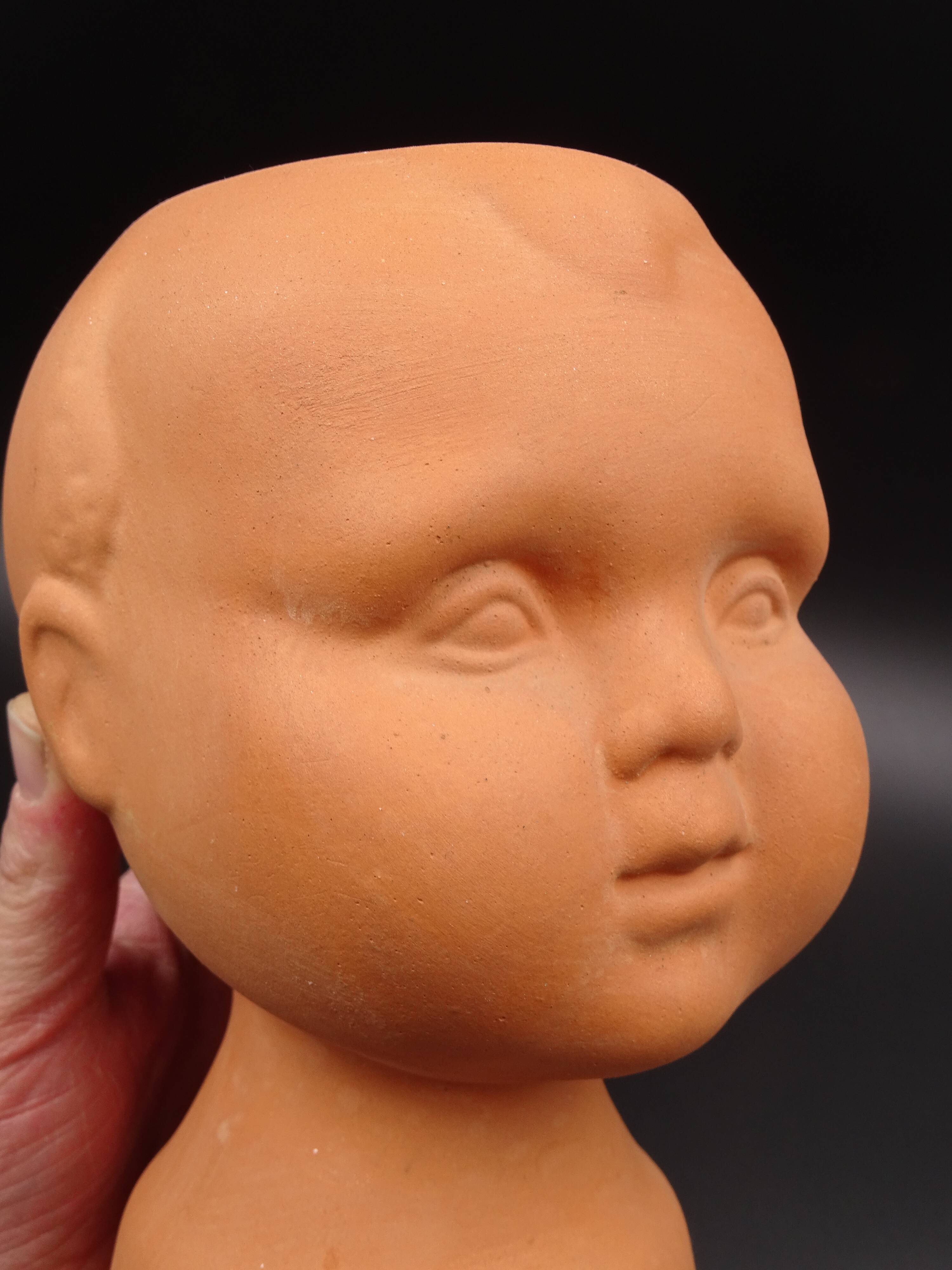 Vase in the shape of a baby's head - poupon